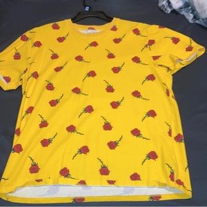 Red rose yellow shirt